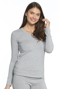 Woman wearing heather grey long sleeve Pima cotton loungewear top and pants