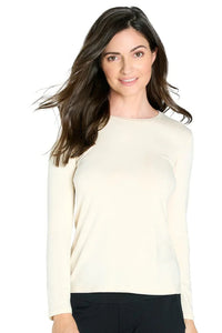 Woman wearing a long sleeve almond beige Pima cotton loungewear top