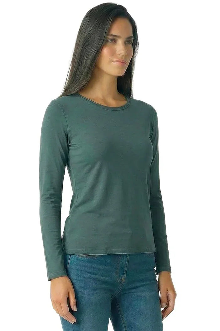 Woman wearing a dark green long sleeve Pima cotton loungewear tee and blue jeans