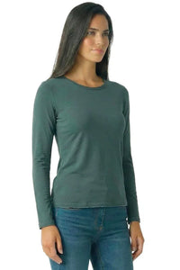 Woman wearing a dark green long sleeve Pima cotton loungewear tee and blue jeans