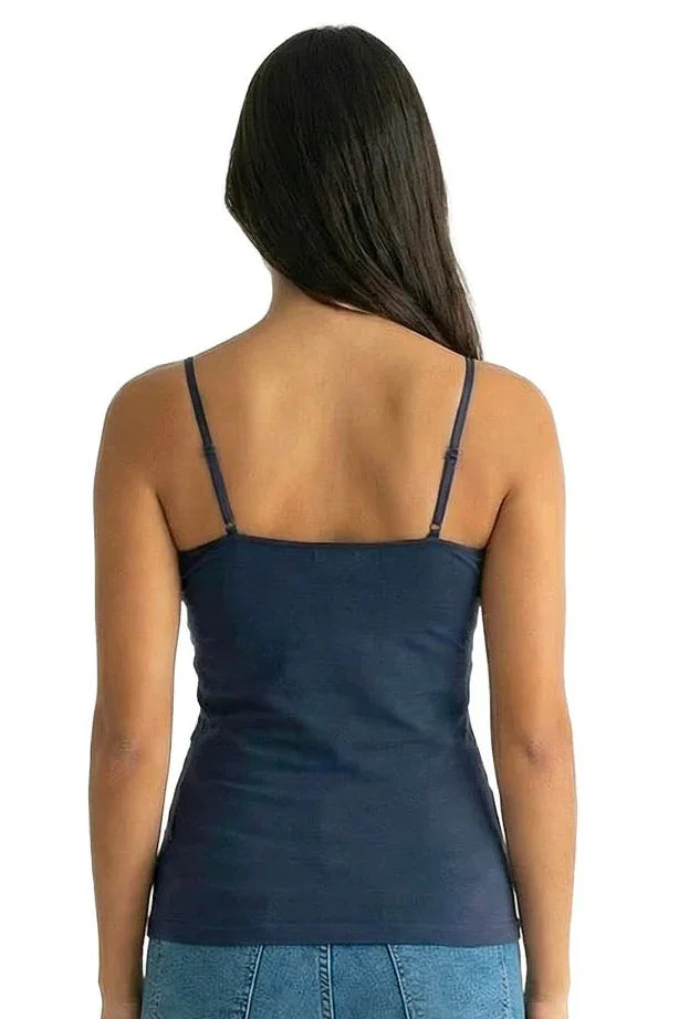 Woman in steel blue camisole top with adjustable straps, seen from the back, wearing jeans