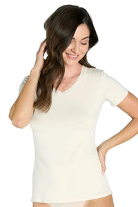 Woman wearing almond beige Pima cotton short sleeve loungewear tee, relaxed fit