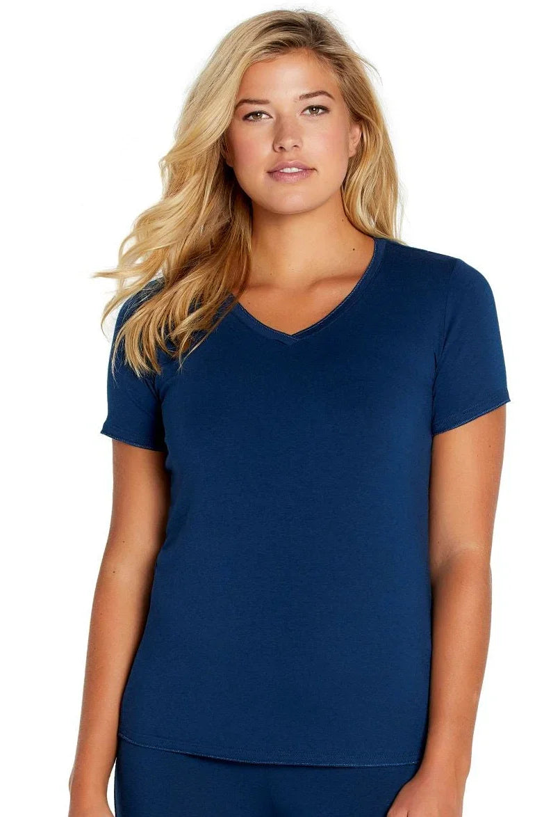 Woman wearing a blue short sleeve V-neck Pima cotton sleepwear tee against white background