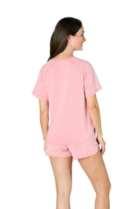 Woman wearing pink short sleeve Pima cotton loungewear sleepwear set, back view