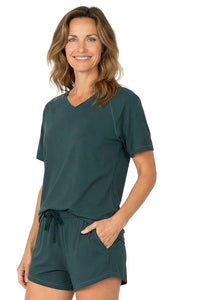 Woman in dark green Pima cotton loungewear sleepwear shorts set with V-neck tee
