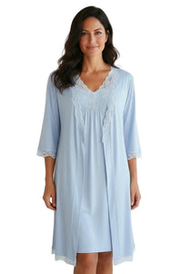 Woman wearing light blue lace-trimmed loungewear robe with three-quarter sleeves