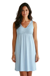 Woman wearing light blue lace trim sleepwear nightgown, soft Pima cotton loungewear