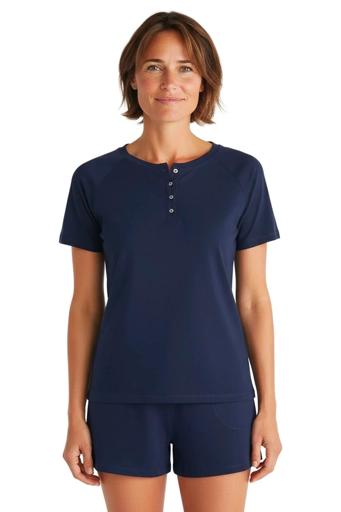 Woman wearing midnight blue Pima cotton loungewear short sleeve top and shorts set
