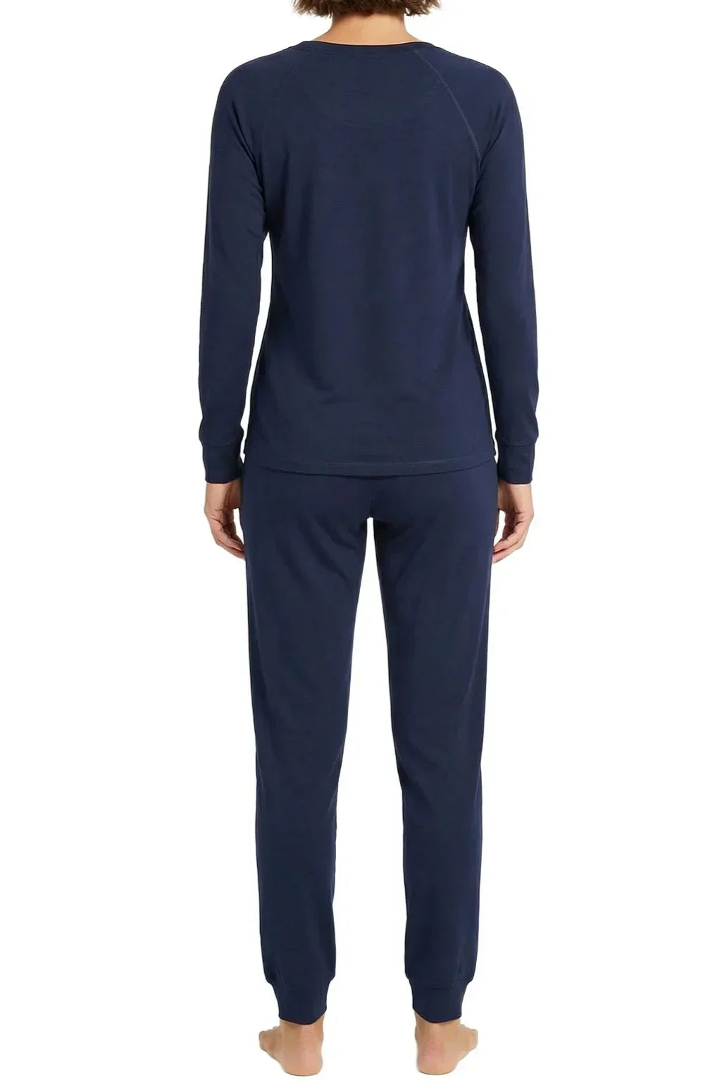 Woman wearing midnight blue Pima cotton loungewear set, long sleeves and pants, back view