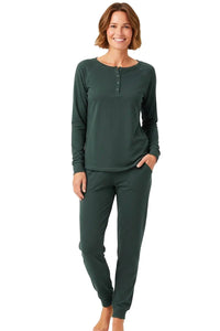 Woman wearing forest green long sleeve Pima cotton loungewear set with jogger pants