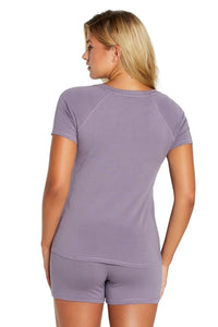 Woman wearing lavender Pima cotton loungewear sleepwear set, short sleeve top and shorts