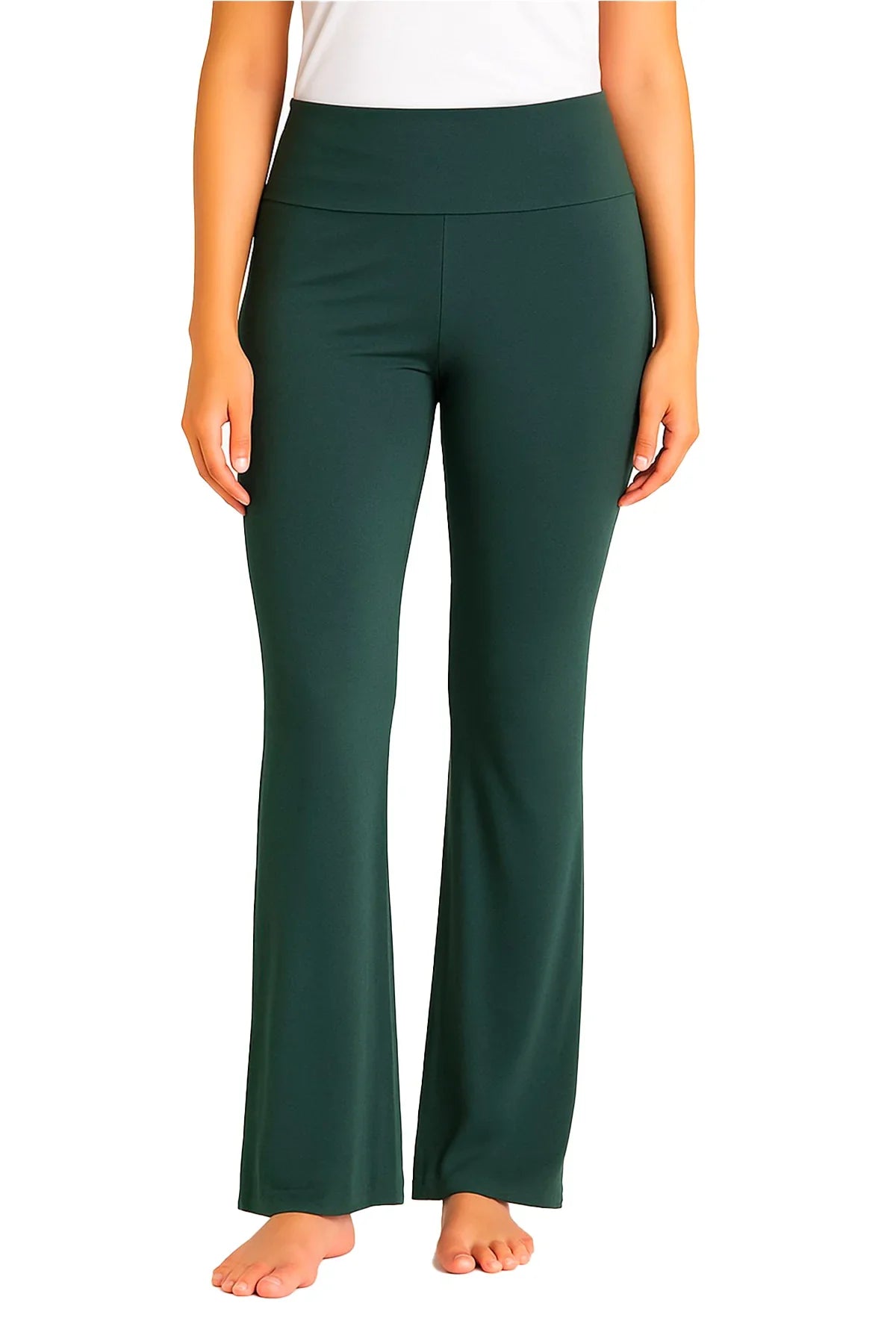 Woman wearing high-waisted spruce green flare yoga pants barefoot on white background