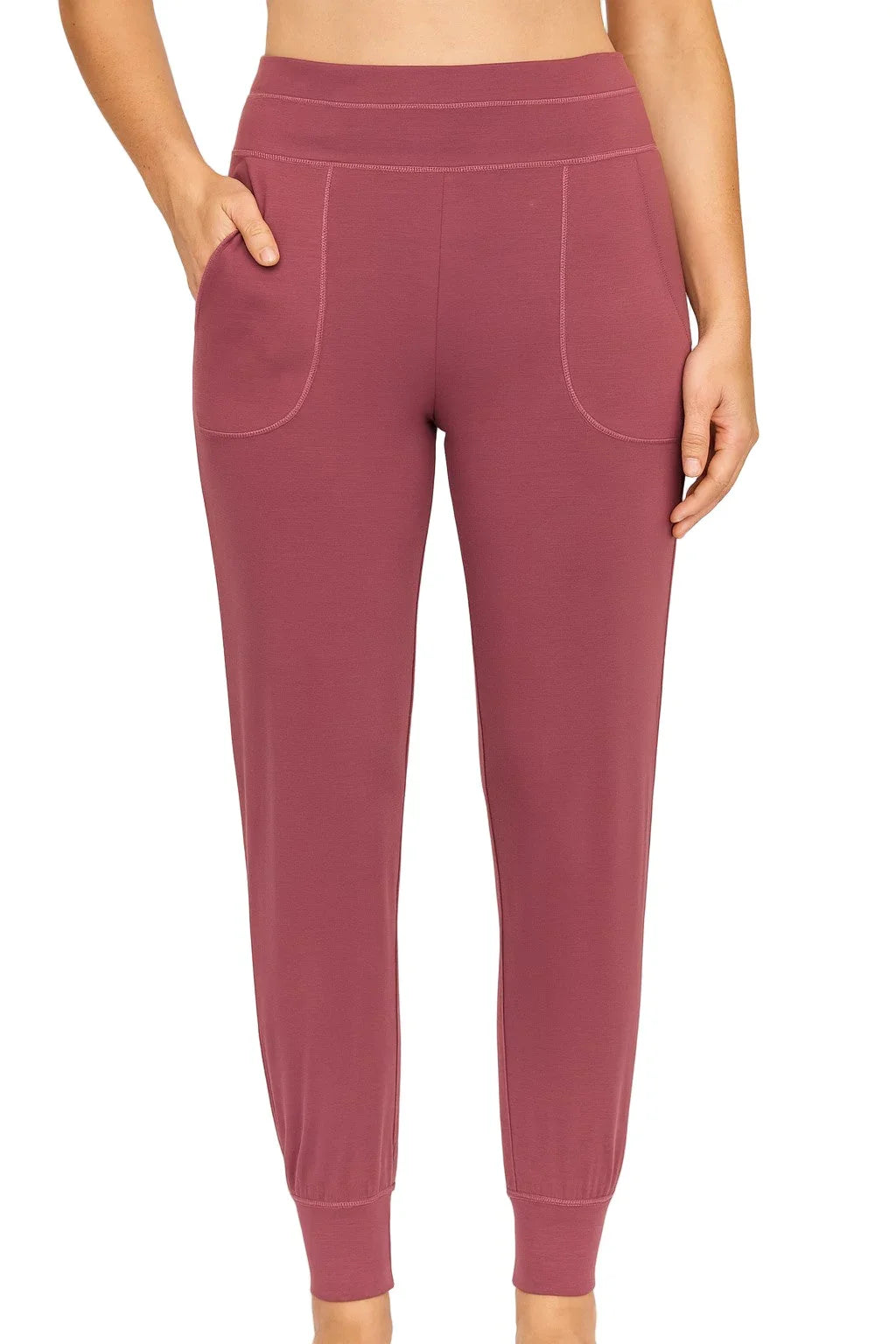 Front view of relaxed fit rosewood jogger pants with pockets and cuffed ankles on model