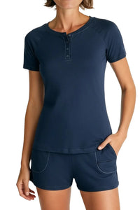 woman wearing steel blue short sleeve henley shirt and matching shorts with pockets