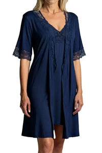 Woman wearing navy blue short sleeve robe with lace trim on sleeves and neckline