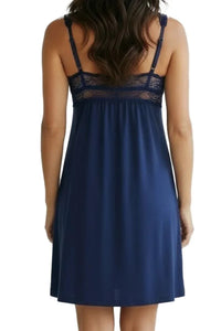 Back view of woman wearing indigo blue lace trim sleeveless nightdress with adjustable straps