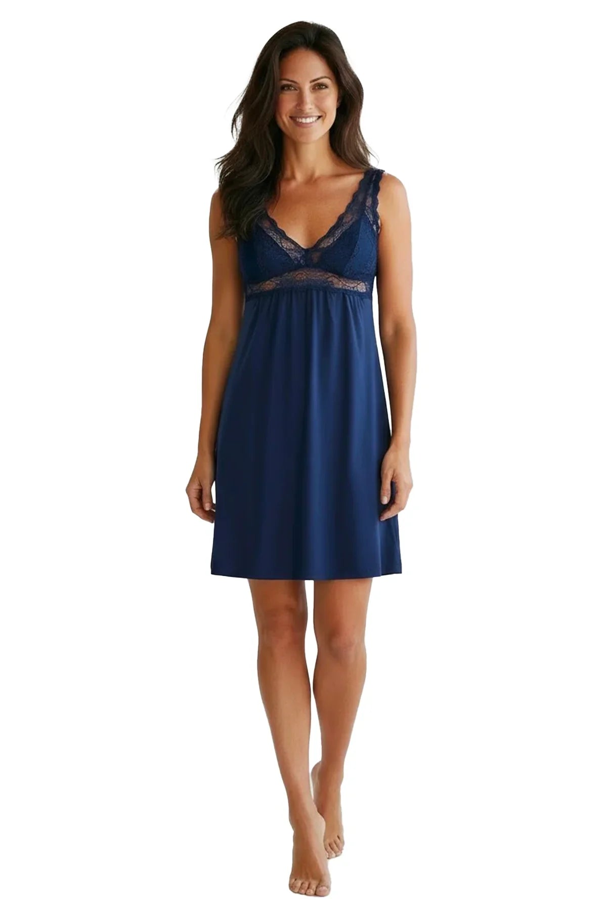 Smiling woman wearing indigo blue nightgown with lace details on shoulders and bust